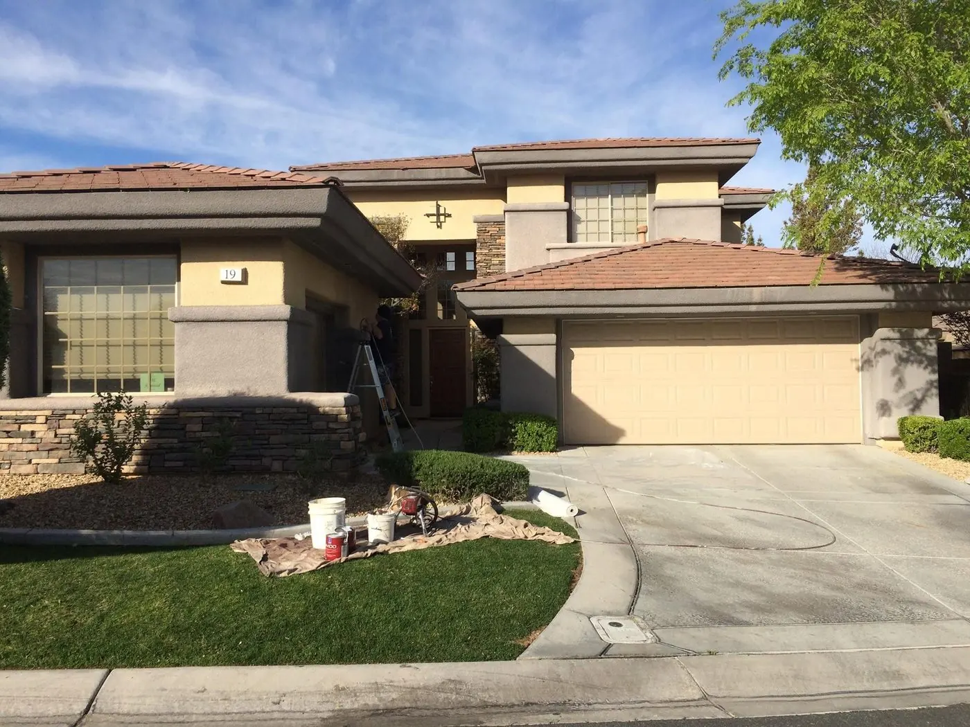 Before: exterior repaint in progress on a two-story Anthem Country Club home in Henderson NV