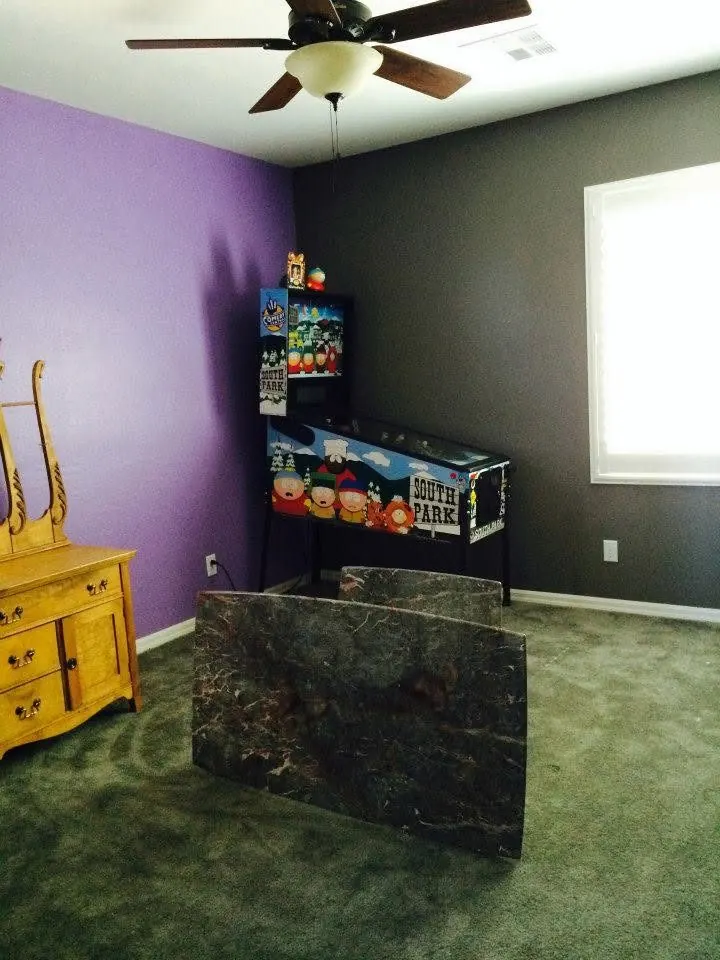 Finished two-tone game room with purple and charcoal accent walls painted by MK Painting Las Vegas