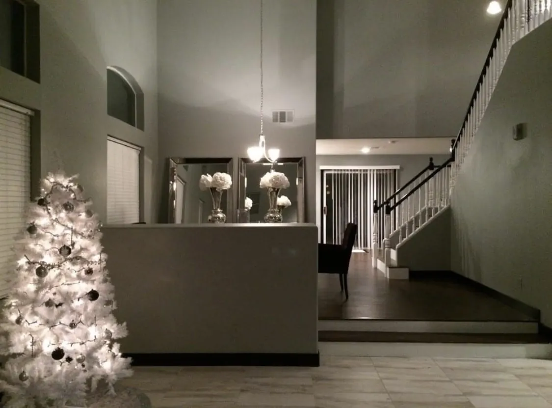 Finished two-story entryway and stairwell interior repaint in a Mountain's Edge Las Vegas home by MK Painting
